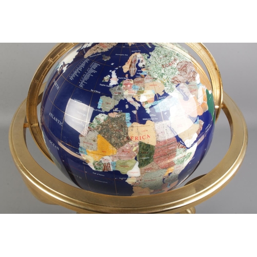 83 - A large modern gemstone globe, comprising of countries being composed of minerals and semi-precious ... 