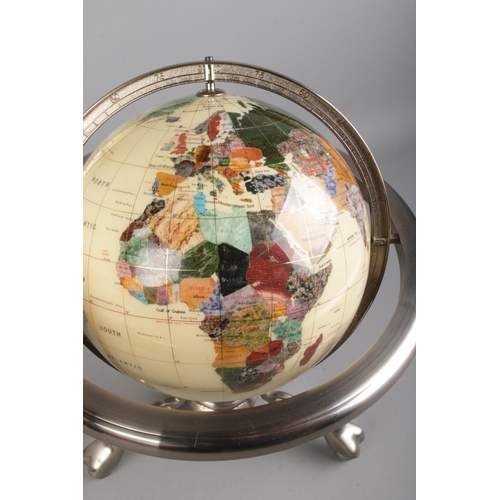 87 - A modern gemstone globe, on chromed base, comprising of countries being composed of minerals and sem... 