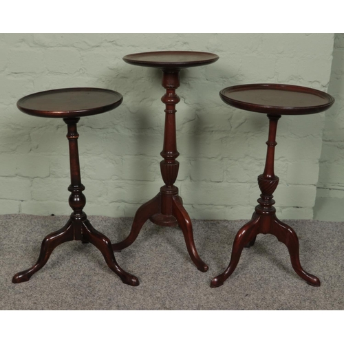 490 - Three carved mahogany wine tables.