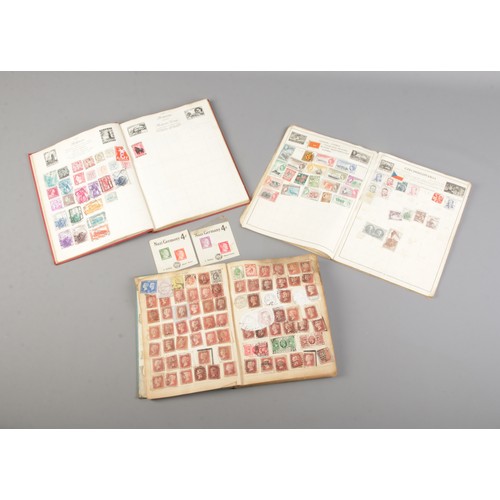 7 - Three albums of stamps including stamps from around the world, historical Nazi Germany stamps and a ... 