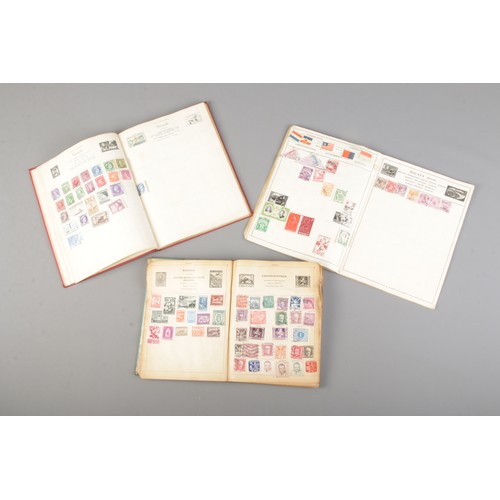 7 - Three albums of stamps including stamps from around the world, historical Nazi Germany stamps and a ... 