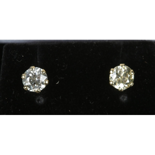123 - A pair of 18ct gold and diamond stud earrings. Assayed for Sheffield and bearing makers mark for LW&... 