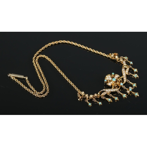 105 - An early 20th century gold, seed pearl and turquoise necklace. Tests to 15ct. 11.15g.