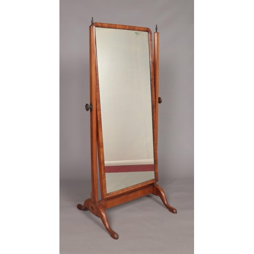 144 - An Edwardian walnut cheval mirror. Height 151.5cm, Width 71cm.