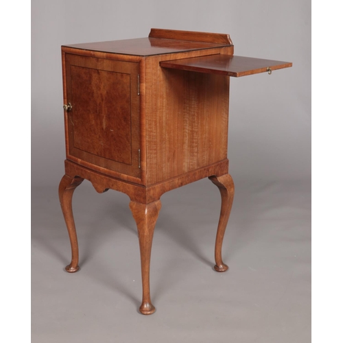 149 - An Edwardian walnut bedside cabinet raised on four cabriole supports. Height 80cm, Width 42cm, Depth... 