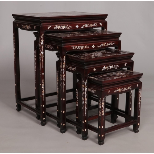 151 - A quartetto of Oriental nesting tables with mother of pearl inlaid decoration. Biggest table - Heigh... 