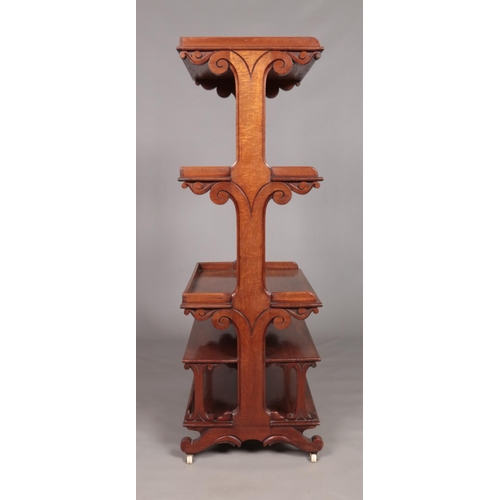 163 - A Victorian carved mahogany five tier Etagere. Height 136cm, Width 69cm, Depth 45cm.