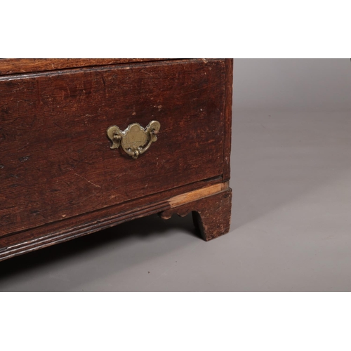 175 - A Georgian oak chest of four drawers raised on ogee bracket feet and having later brass handles. Hei... 
