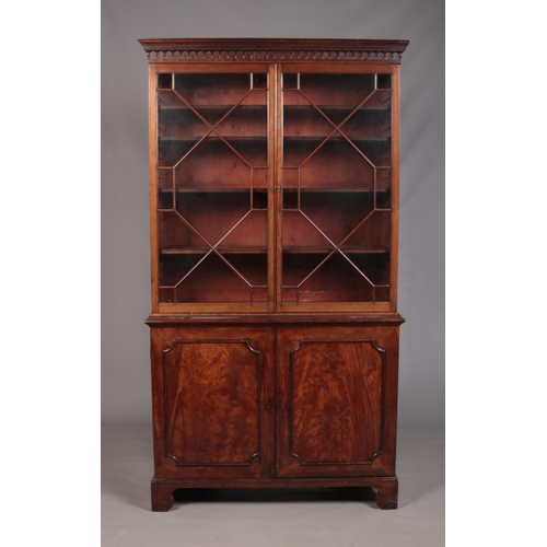 187 - A large Victorian mahogany bookcase with astragal glazed top over cupboard base. Height 216cm, Width... 