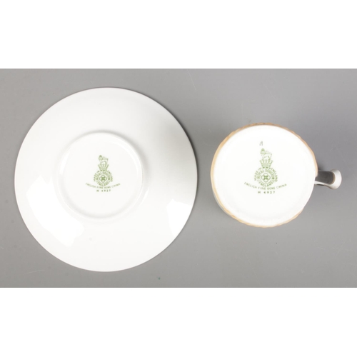 23 - A Royal Doulton bone china coffee set decorated in the Reynard The Fox design, H4927.