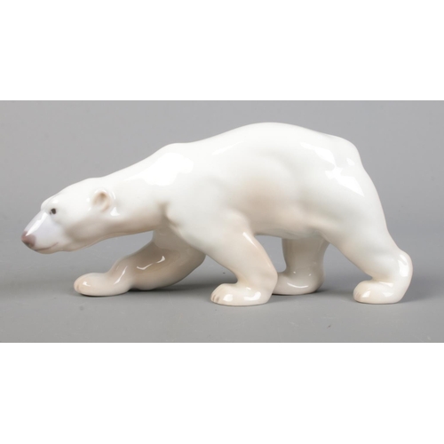24 - A Bing & Grondahl ceramic model of a polar bear designed by Svend Jespersen. Model 2218. Length 13cm... 