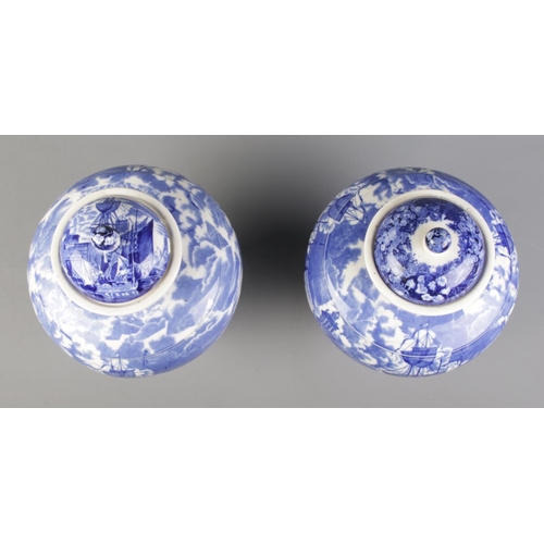25 - A large pair of late 19th/early 20th century Wedgwood blue and white lidded vases decorated in the F... 