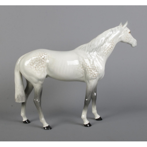 26 - A large Beswick horse in dapple grey, model 1564. Height 28cm.