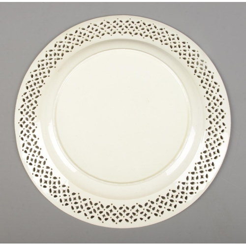 3 - An English 18th century creamware plate with reticulated border, probably Leeds Pottery. Diameter 24... 