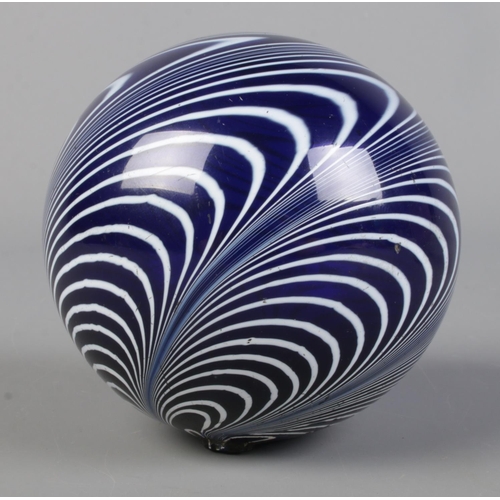 30 - A Nailsea type glass Witch Ball along with a similar amethyst and white glass tumbler. Height of tum... 