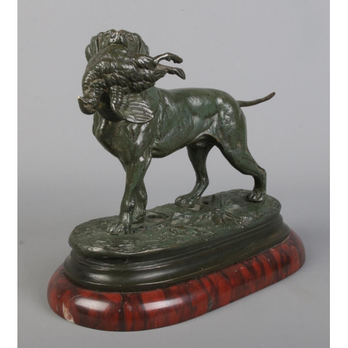 39 - Edouard Paul Delabrierre (1829-1912), a bronze sculpture depicting a hunting dog with game bird in m... 