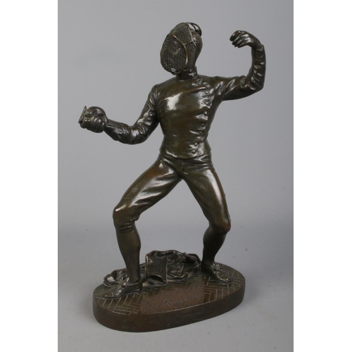 40 - After Benedict B Rougelet, a pair of bronze fencers, signed F Lombard. Height 28cm.