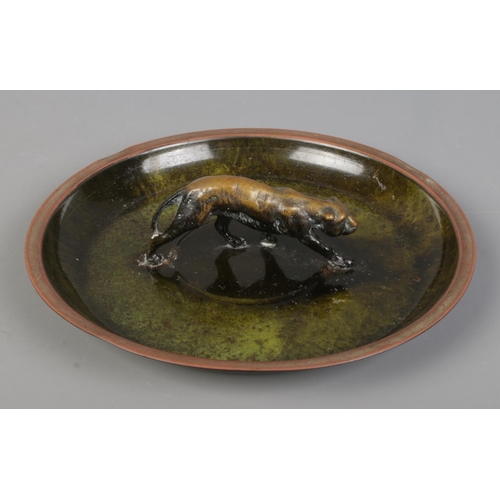 41 - A 1930s Danish bronze dish surmounted with a wild cat. Marked to base Bronce, Denmark. Diameter 21cm... 