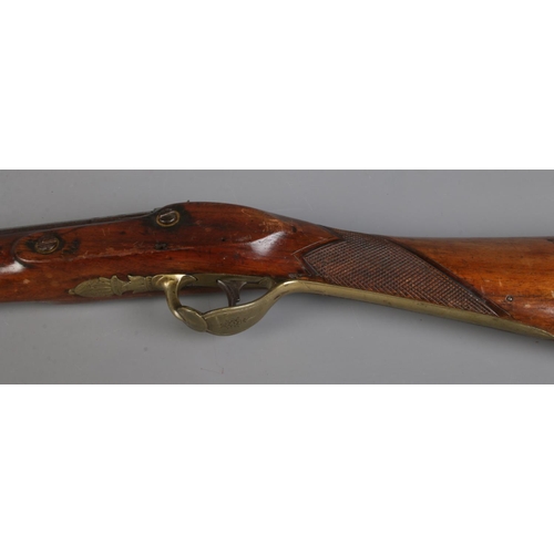 49 - A 19th century percussion rifle. The lock plate stamped for Hickman. Barrel length 105cm. CAN NOT PO... 