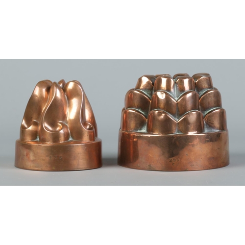 55 - Two Victorian copper jelly moulds. Diameters 13cm and 11cm.