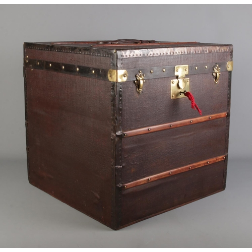 63 - A large 19th century French wood and metal bound ladies hat box. 49.5cm x 49.5cm x 49.5cm.