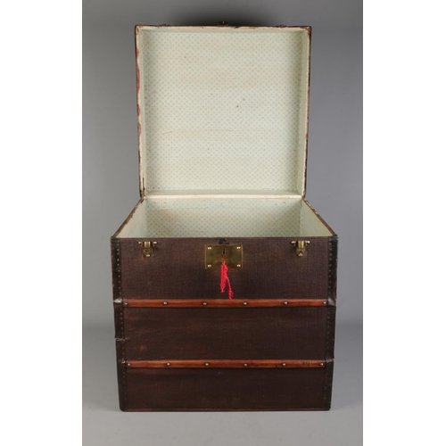 63 - A large 19th century French wood and metal bound ladies hat box. 49.5cm x 49.5cm x 49.5cm.