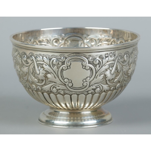 73 - A Victorian silver pedestal bowl with repousse decoration. Assayed London 1893 by John Bodman Carrin... 