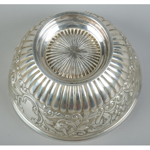 73 - A Victorian silver pedestal bowl with repousse decoration. Assayed London 1893 by John Bodman Carrin... 