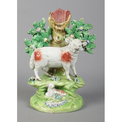 8 - A 19th century Staffordshire spill vase by John Walton, bocage group with ram and lamb. Height 18cm.