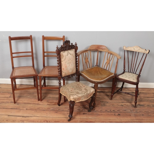 497 - Five chairs. Includes carved mahogany hall chair, pair of Edwardian bergère seat bedroom chairs, cor... 