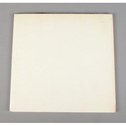 204 - The Beatles White Album No. 0313402 top opening stereo pressing. Includes original poster and two of... 