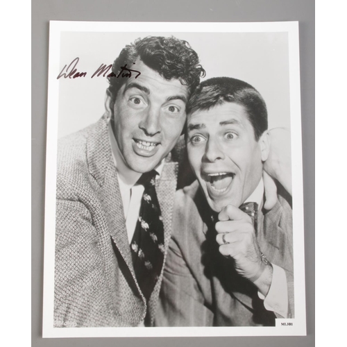 220 - A quantity of monochrome photographs and film stills, some signed. Autographed Dean Martin, The Poli... 