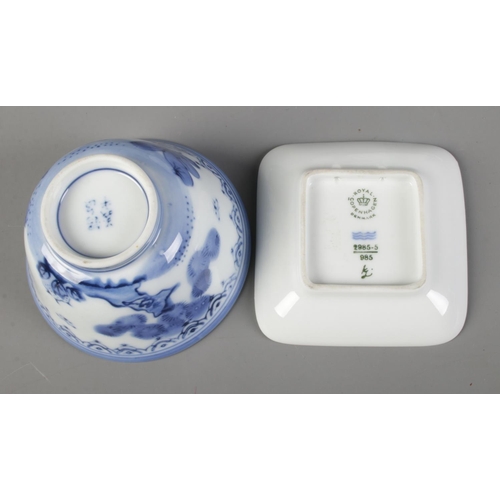 265 - A collection of blue and white ceramics to include Royal Copenhagen stork dish, oriental bowl with c... 