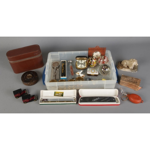 274 - A tray of assorted collectables to include boxed glass nasal douche, travel vanity set, harmonicas, ... 