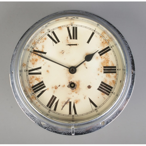 276 - A Smith's Coventry Astral bulkhead clock, in circular chrome mount. The cream enamel Roman Numeral d... 