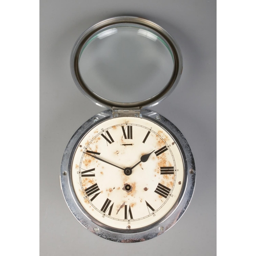 276 - A Smith's Coventry Astral bulkhead clock, in circular chrome mount. The cream enamel Roman Numeral d... 