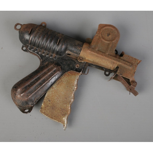 278 - A 1930's Langson Nu-Matic paper buster/popper gun. Mechanism working.