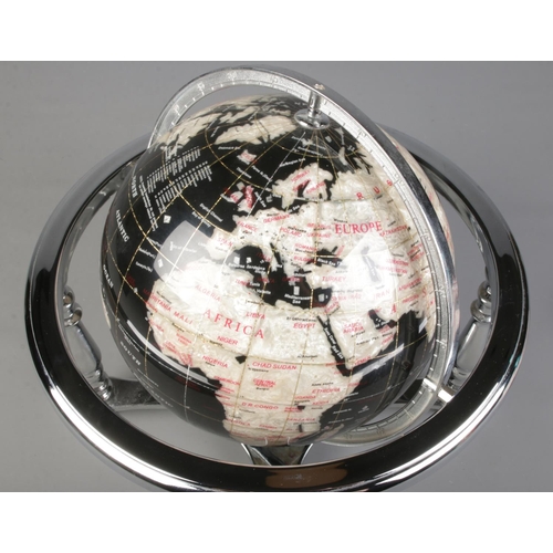 280 - A gemstone globe, with chrome supports and deep blue backing set with mother of pearl for the countr... 