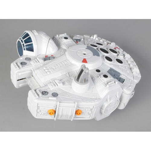 284 - A Hasbro model of the Star Wars Millennium Falcon. Dated 2011, missing figures.