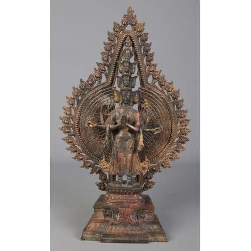 290 - A cast metal figure formed as a thousand arm deity/Avalokiteshvara. Height 40.5cm.