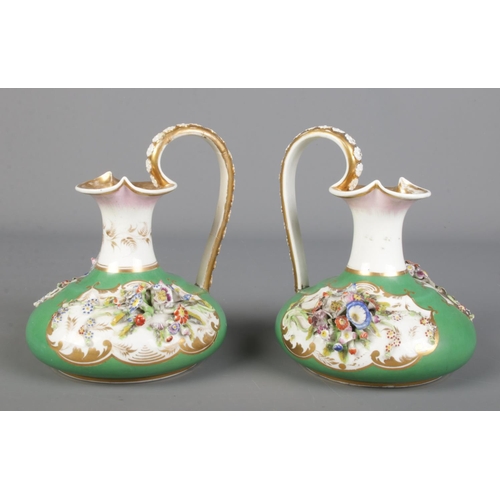 291 - A pair of 19th century Derby Bloor ewers, green ground with applied flowers and gilt decoration. 15c... 