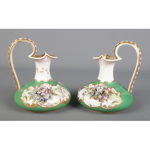 291 - A pair of 19th century Derby Bloor ewers, green ground with applied flowers and gilt decoration. 15c... 