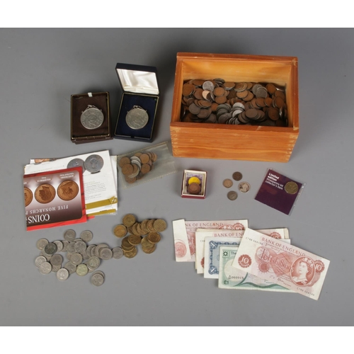 302 - A large collection of British pre-decimal coins to include several half silver examples, small quant... 