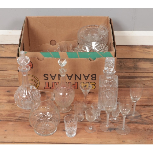 312 - A box of glass. Includes Edwardian decanter & glasses, modern air twist stem examples, etc.