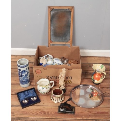 313 - A box of miscellaneous. Includes hand painted floral jug, Royal Doulton, silver plated tray, resin f... 