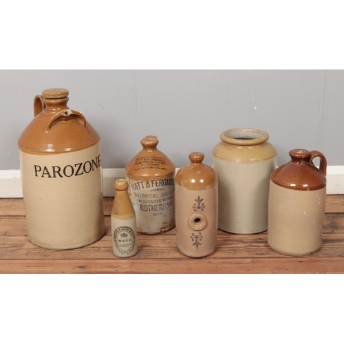 325 - A collection of stoneware flagons to include Watt & Ferguson and Wath stamped examples.