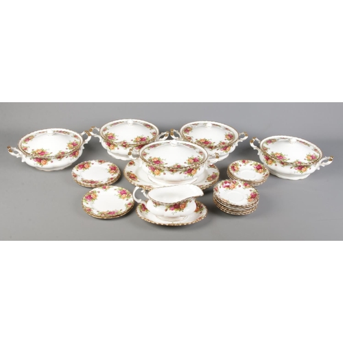 329 - A box of Royal Albert Old Country Roses dinnerwares. Includes tureens, gravy boat, saucers, etc.