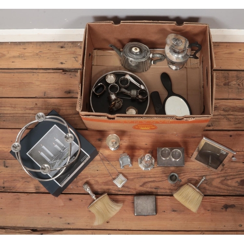 343 - A box of assorted silver plate and pewter items. To include boxed Georg Jensen season candlestick, s... 