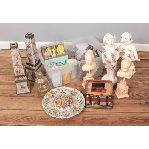 356 - Two boxes of miscellaneous. Includes large pottery candlesticks, pair of floral figures, vintage gen... 