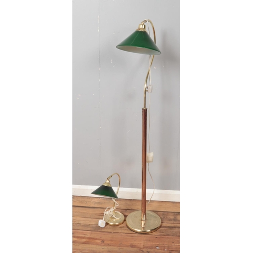 362 - Two brass lamps with green glass shades including floor and desk lamp.